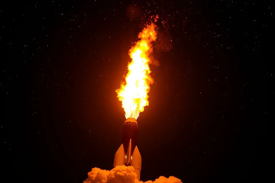 rocket flames night sky