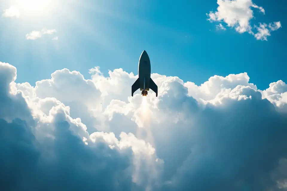 rocket silhouette with clouds