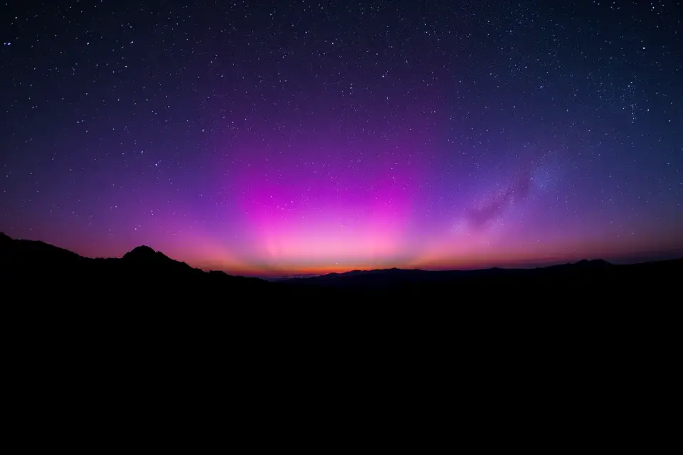 silhouetted landscape space horizon