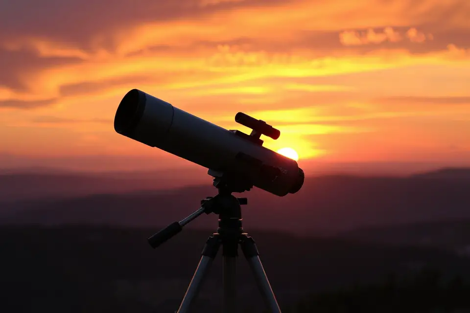 telescope at vibrant sunset